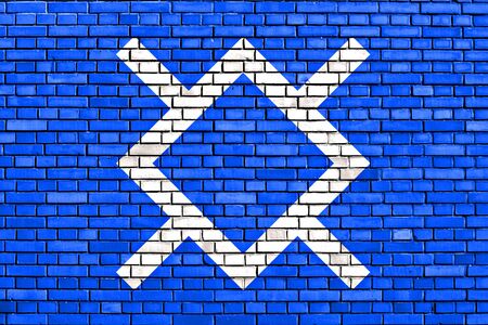 flag of Northern Cheyenne painted on brick wallの写真素材