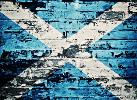 flag of Scotland painted on old brick wallの写真素材