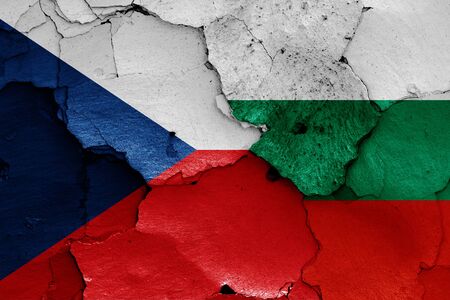flags of Czechia and Bulgaria painted on cracked wallの写真素材
