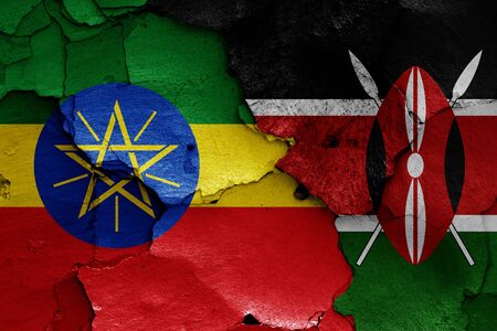 flags of Ethiopia and Kenya painted on cracked wallの写真素材