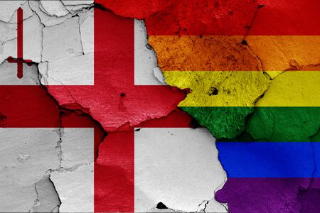 flags of London  and LGBT painted on cracked wallの写真素材