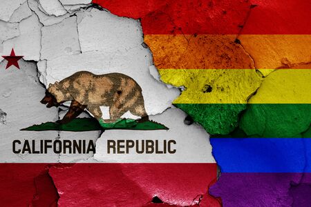 flags of California and LGBT painted on cracked wallの写真素材