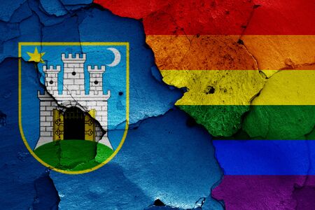 flags of Zagreb and LGBT painted on cracked wallの写真素材