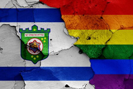 flags of Tel Aviv and LGBT painted on cracked wallの写真素材