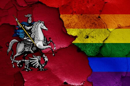 flags of Moscow and LGBT painted on cracked wallの写真素材