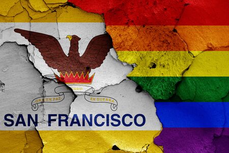 flags of San Francisco and LGBT painted on cracked wallの写真素材