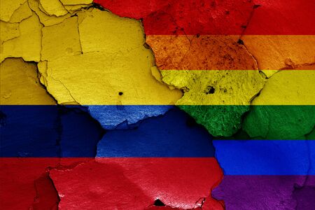 flags of Colombia and LGBT painted on cracked wallの写真素材