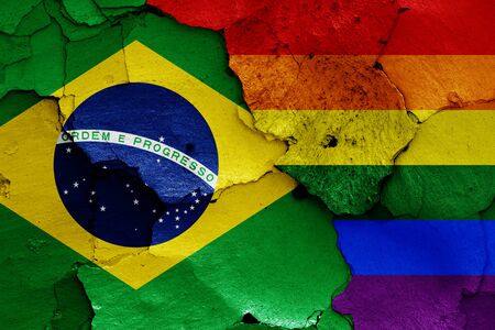 flags of Brazil and LGBT painted on cracked wallの写真素材