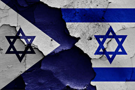 flags of Israeli Navy and Israel painted on cracked wallの写真素材