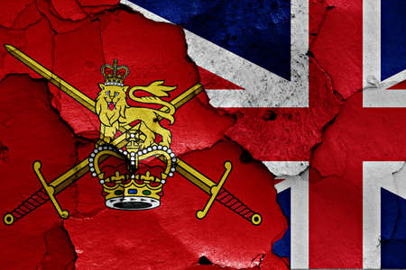 flags of British Army and UK painted on cracked wallの写真素材
