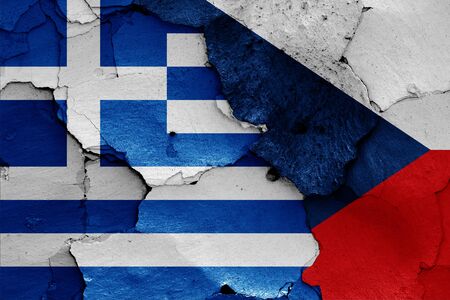 flags of Greece and Czech republic painted on cracked wallの写真素材