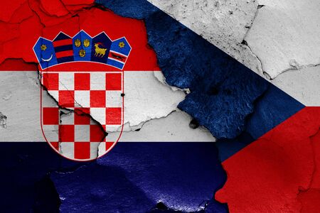 flags of Croatia and Czech republic painted on cracked wallの写真素材