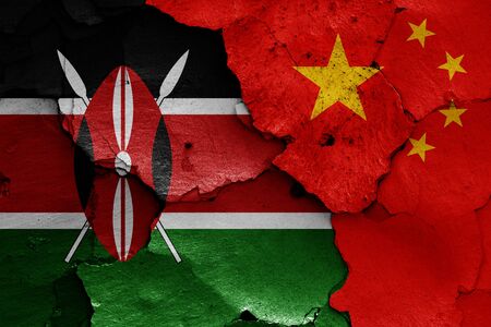 flags of Kenya and China painted on cracked wallの写真素材
