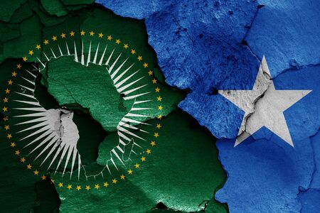 flags of African Union and Somalia painted on cracked wallの写真素材
