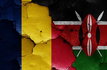 flags of Chad and Kenya painted on cracked wallの写真素材
