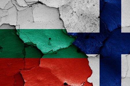 flags of Bulgaria and Finland painted on cracked wallの写真素材