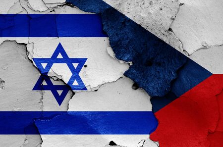 flags of Israel and Czech Republic painted on cracked wallの写真素材