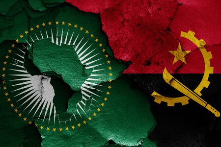 flags of African Union and Angola painted on cracked wallの写真素材