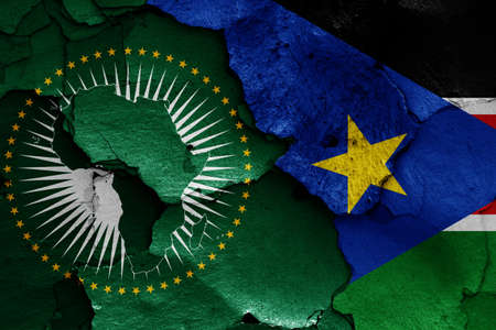flags of African Union and South Sudan painted on cracked wallの写真素材