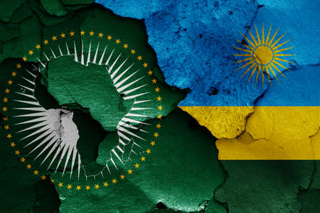 flags of African Union and Rwanda painted on cracked wallの写真素材