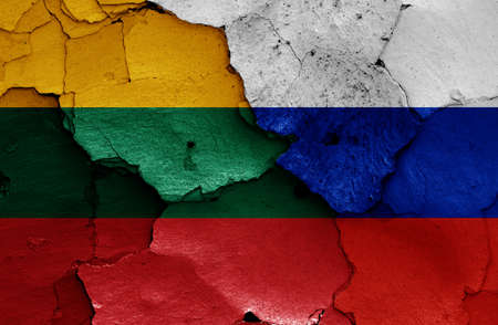flags of Lithuania and Russia painted on cracked wallの写真素材