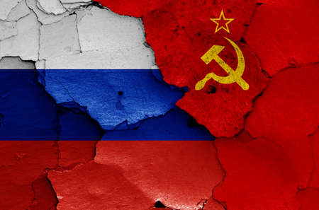 flags of today Russia and former Soviet Union painted on cracked wallの写真素材