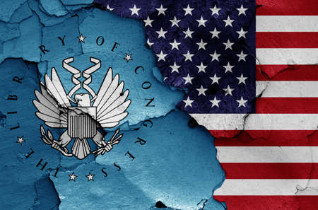 flags of Library of Congress and USA painted on cracked wallの写真素材