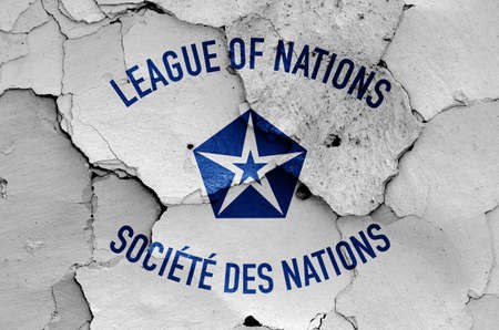 Flag of League of Nations painted on cracked wallの写真素材