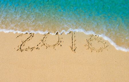 2016 Soft wave of blue ocean on sandy beach. Background. Selective