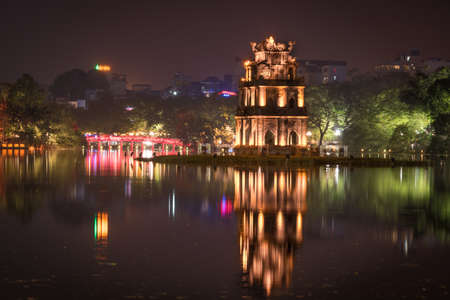 Turtle tower on Hoan Kiem Lake at Night in Hanoi, Vietnamの写真素材