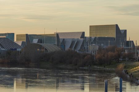 Zaragoza, Spain - February 2, 2020: Several buildings of futuristic and contemporary design, part of the old Zaragoza Expo, make up a unique view during a winter sunset.のeditorial素材