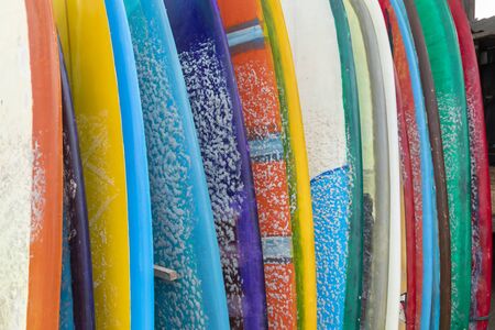 Texture of surfboards, covered in paraffin, stored waiting for a surfer on the beach of Canggu, south of Bali, Indonesia, on a hot August day.の写真素材