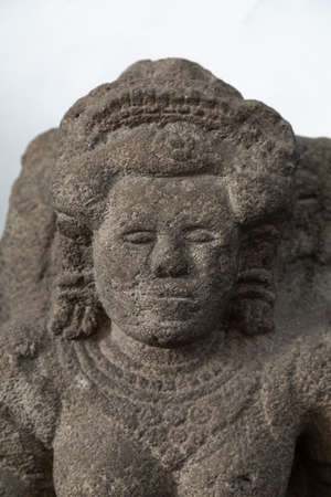 Jakarta, Indonesia - July 14, 2019: Ancient stone sculpture, classical Buddhist period. It is part...