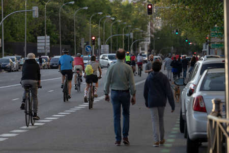 Madrid, Spain - May 02, 2020: People walking and doing individual sport in a massive way in central Madrid, during the first day of phase zero of de-escalation during the COVID-19 pandemic.のeditorial素材