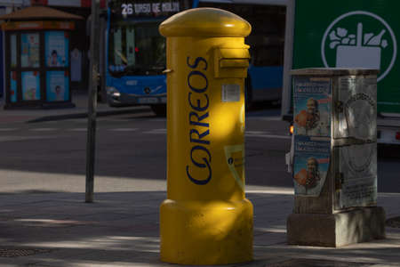 Madrid, Spain - May 19, 2020: Postal mailbox of the state postal service on Ibiza street, in the Retiro district.のeditorial素材