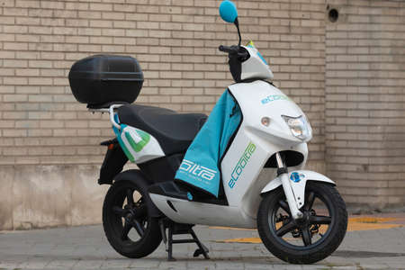 Madrid, Spain - May 19, 2020: Electric motorcycle of the shared system transport service from the eCooltra company, parked in O'donell street.のeditorial素材