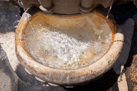 Rome, Italy - June 28, 2010: Detail of one of the many fresh and crystalline water fountains that can be found in Rome.のeditorial素材