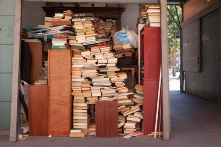 Rome, Italy - June 28, 2010: Stacks of old books at a street stall in the center of Rome.のeditorial素材
