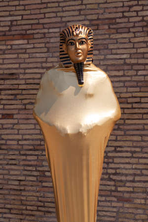Rome, Italy - June 28, 2010: A person works, very still, as a mime, disguised as an Egyptian...