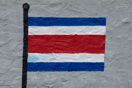 Childish style drawing, of the flag of Costa Rica, painted on a wall.の写真素材