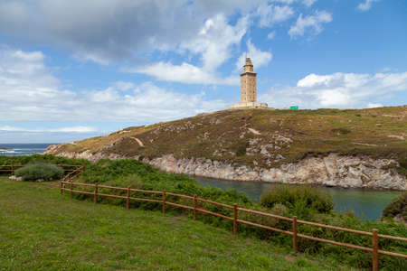 Torre de Hercules in La Coruna, lighthouse built by the ancient Roman empire 2000 years ago, in a seascape from Las Lapas beach area, in northern Galicia, Spain.のeditorial素材