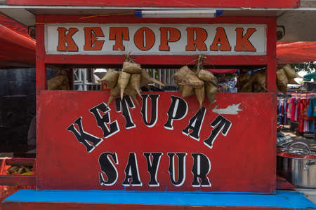 Jakarta, Indonesia - October 20, 2019: Street food stall, in which sell nasi goreng, mie ayam, bakso ... Typical Indonesian food, in the Central Jakarta district. Travel photography.のeditorial素材
