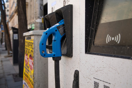 Madrid, Spain - February 07, 2021: Charging point for electric and hybrid cars in the center of the...