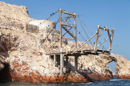 Dock for boats in the Ballestas Islands, within the protected area of the Paracas national reserve, north coast of the Paracas peninsula, Pisco, department of Ica, Peru.の写真素材