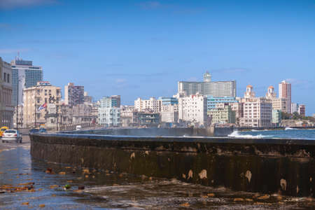 Havana, Cuba - March 23, 2010: Coastal urban landscape of central Havana and towards the Vedado district, with the characteristic wall that protects the Malecon promenade, near the Antonio Maceo Park.のeditorial素材