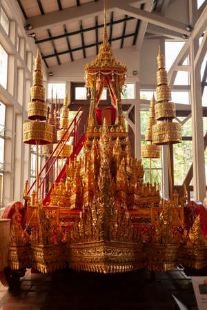 Bangkok, Thailand - March 25, 2018: Royal carriage decorated with many golden details, in the Raja Ratha Hall building, part of the public collection of the Bangkok National Museum.のeditorial素材