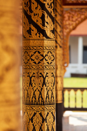 Bangkok, Thailand - March 25, 2018: Small temple or chapel, with plant motifs drawn on its columns next to Phra tamnak Daeng, in Bangkok National Museum, example of Thai architecture.のeditorial素材