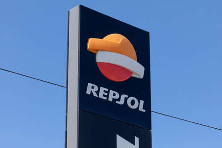 Asturias, Spain - August 16, 2020: Corporate logo of the Spanish oil company Repsol, in one of its service and refueling stations for gasoline, diesel, and fuel, located in Asturias, Spain.のeditorial素材