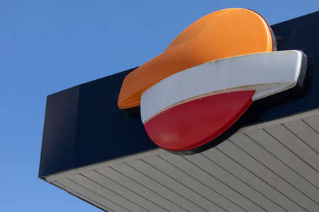 Asturias, Spain - August 16, 2020: Corporate logo of the Spanish oil company Repsol, in one of its service and refueling stations for gasoline, diesel, and fuel, located in Asturias, Spain.のeditorial素材
