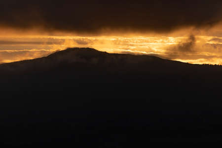 Photograph of breathtaking summer sunset landscapes, mountainous, misty and full of clouds, on the Galician coast, Ortigueira, near Cape Ortegal, La CoruÃ±a province, Spain.の写真素材